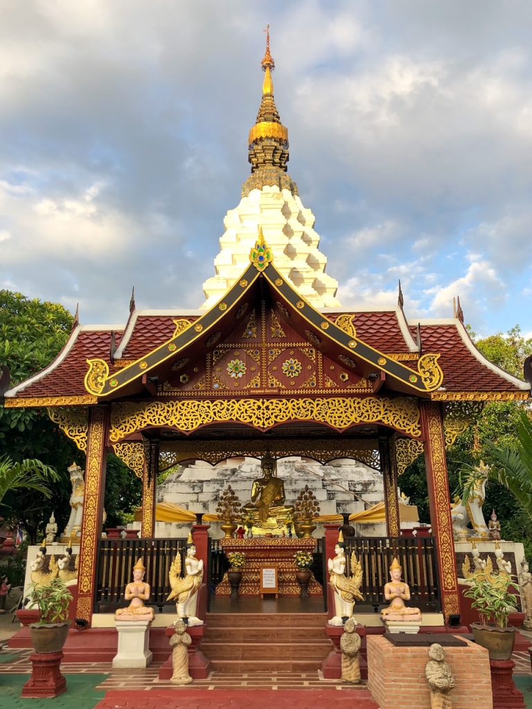 a moody sky over a temple in Chiang Mai Thailand