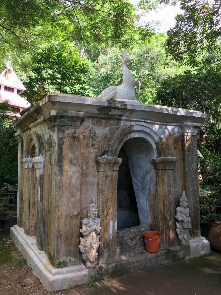 a peacock statue at Wat Pha Lat in Chiang Mai