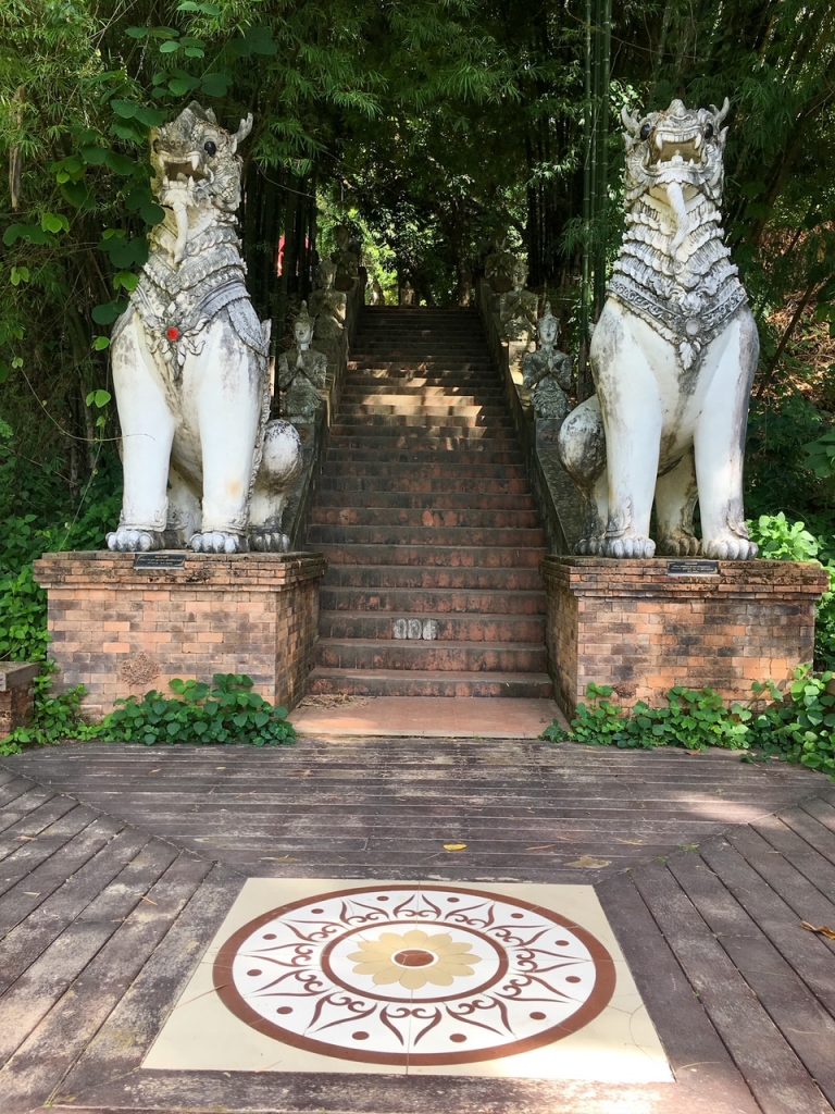 cool dragon statues at Wat Pha Lat along Monks Trail
