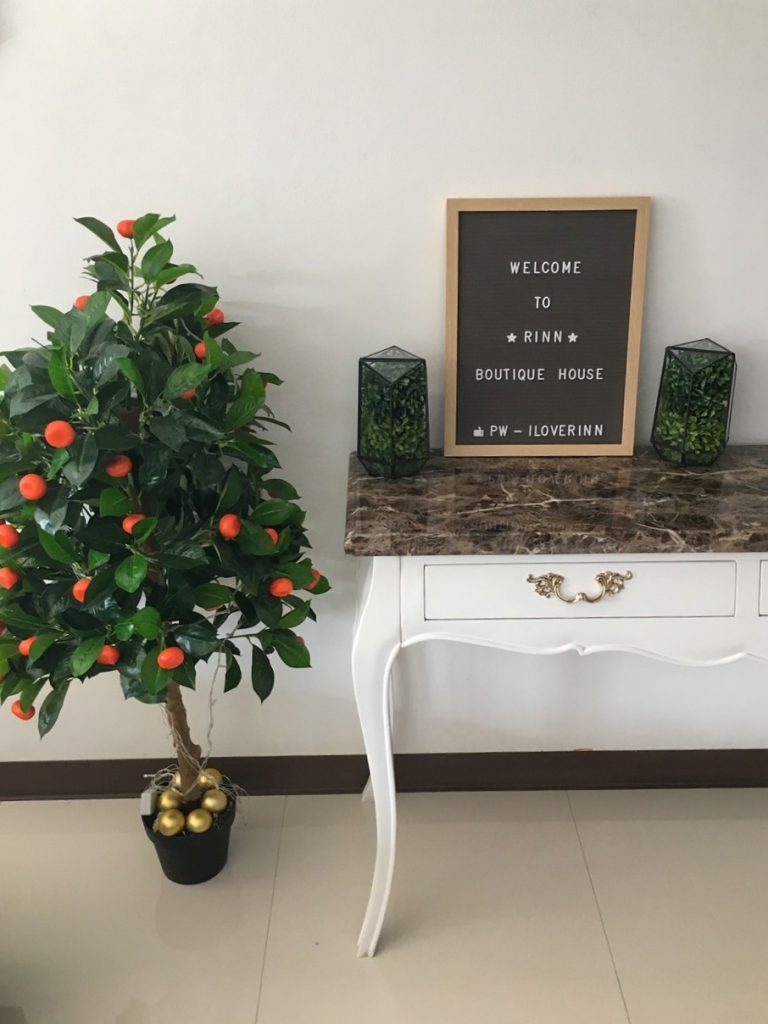 welcome sign at Rinn Boutique House in Chiang Mai
