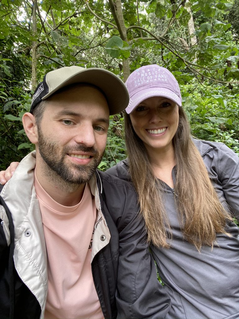 a couple taking a selfie inside Mount Kenya National Park on their guided nature walk