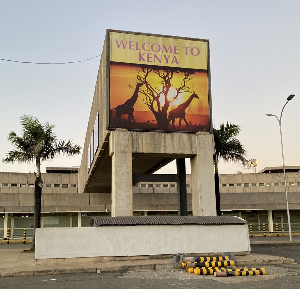 Welcome to Kenya sign at the Nairobi airport in Kenya