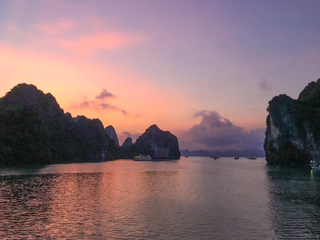 the sunset over Bai Tu Long Bay in Vietnam
