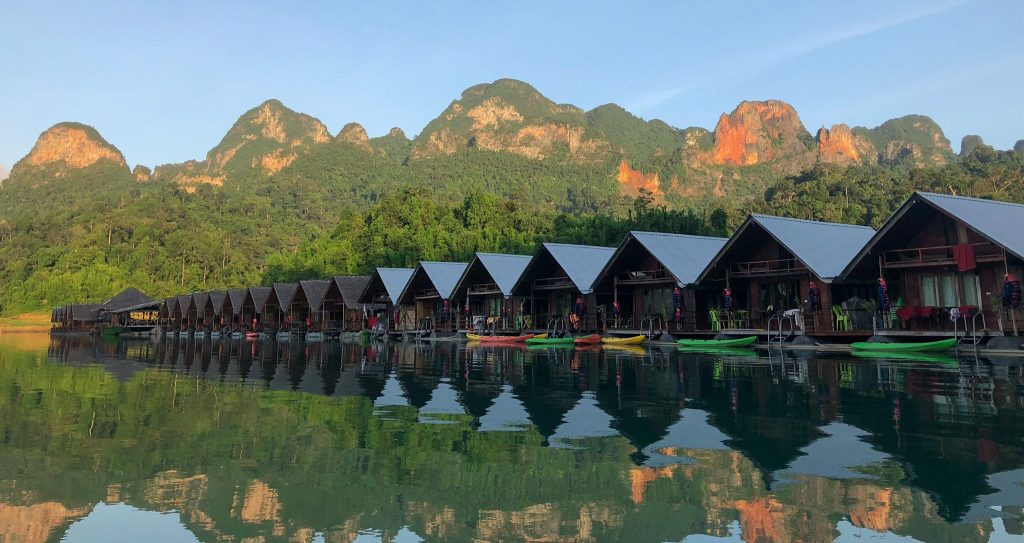 Cheow Larn Lake in Khao Sok National Park is one of the best places to visit in Thailand in July