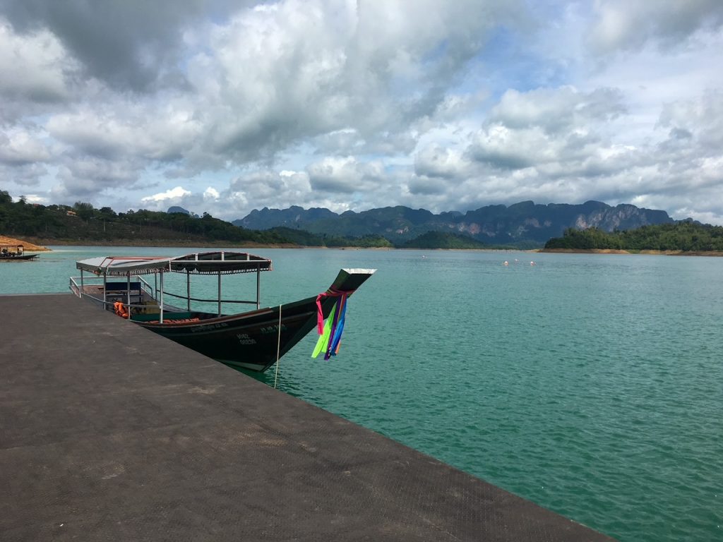 a longtail boat on Cheow Larn Lake in Khao Sok National Park