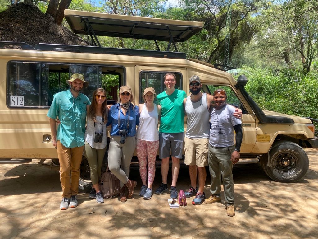 three couples and their driver from Sense of Africa in front of the safari vehicle at Samburu Intrepids Lodge
