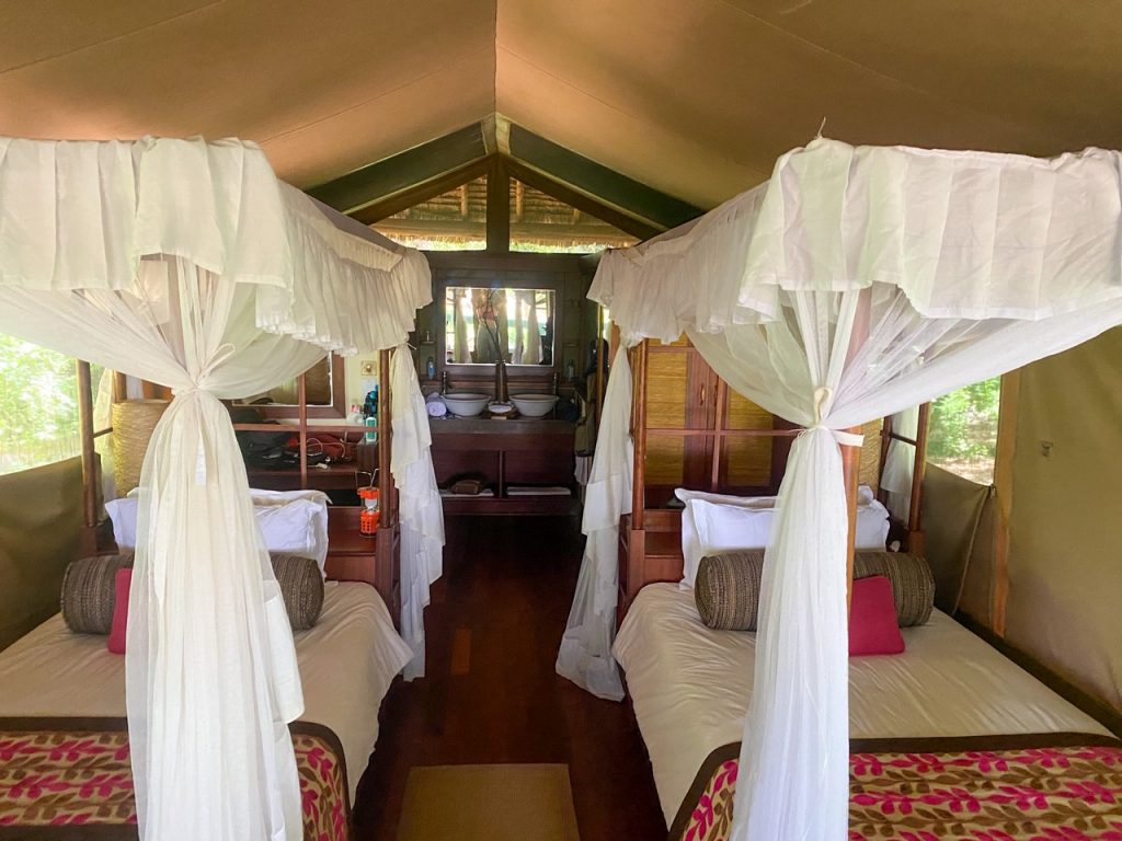 Comfortable beds surrounded by mosquito nets at Samburu Intrepids Lodge