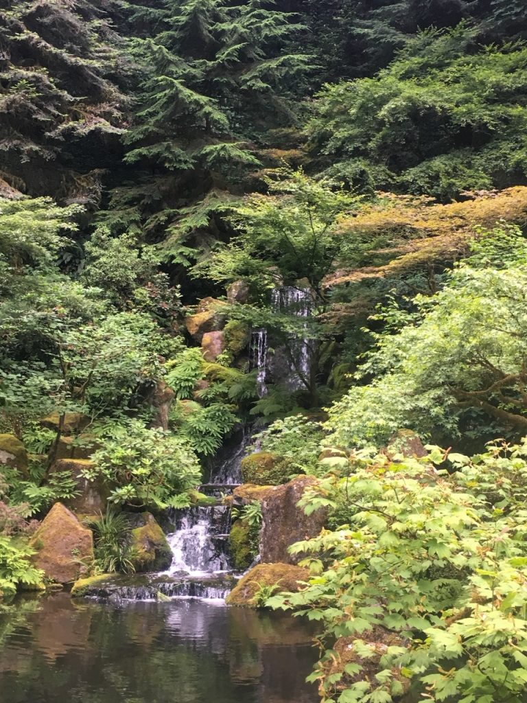 a small waterfall at the Portland Japanese Garden
