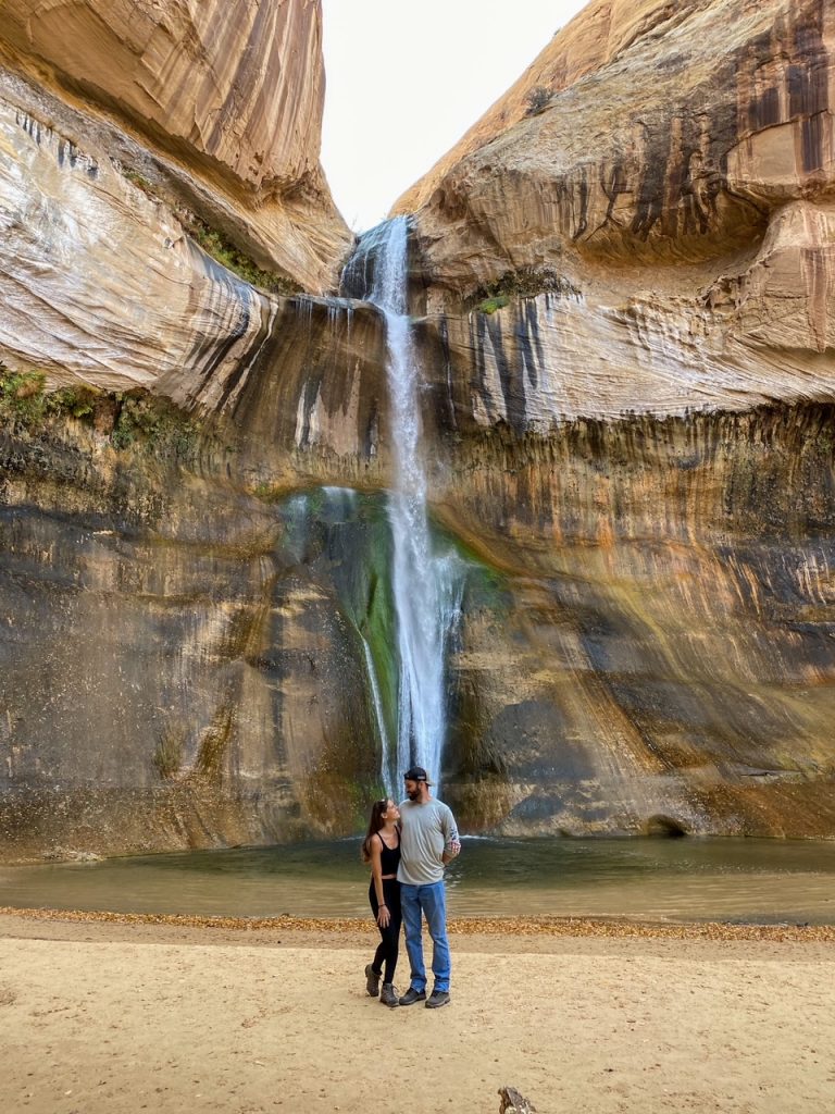 Sara & Tim posing at Lower Calf Creek Falls