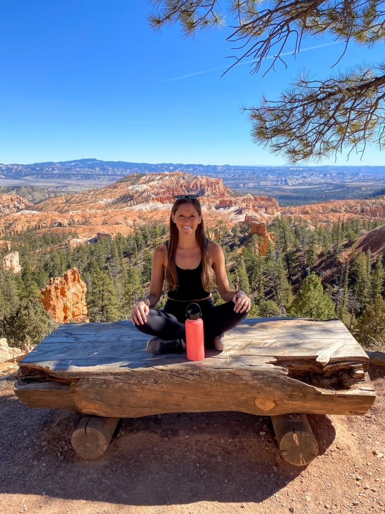 Sara with her water bottle at Sunrise Point after hiking all day in Bryce Canyon National Park