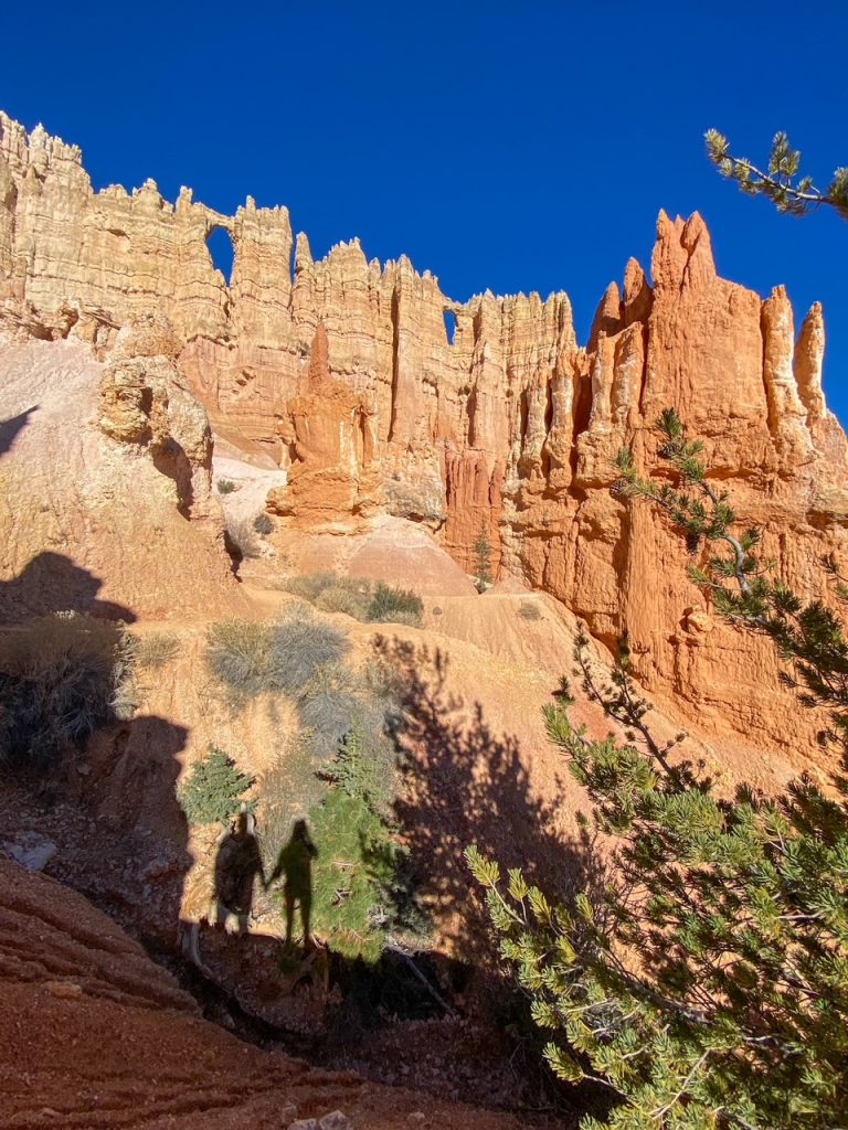 Tim and Sara holding hands at the Wall of Windows in Bryce Canyon National Park