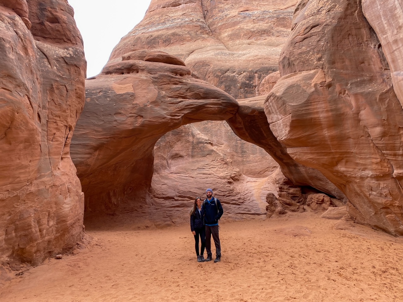 standing under Sand Dune Arch