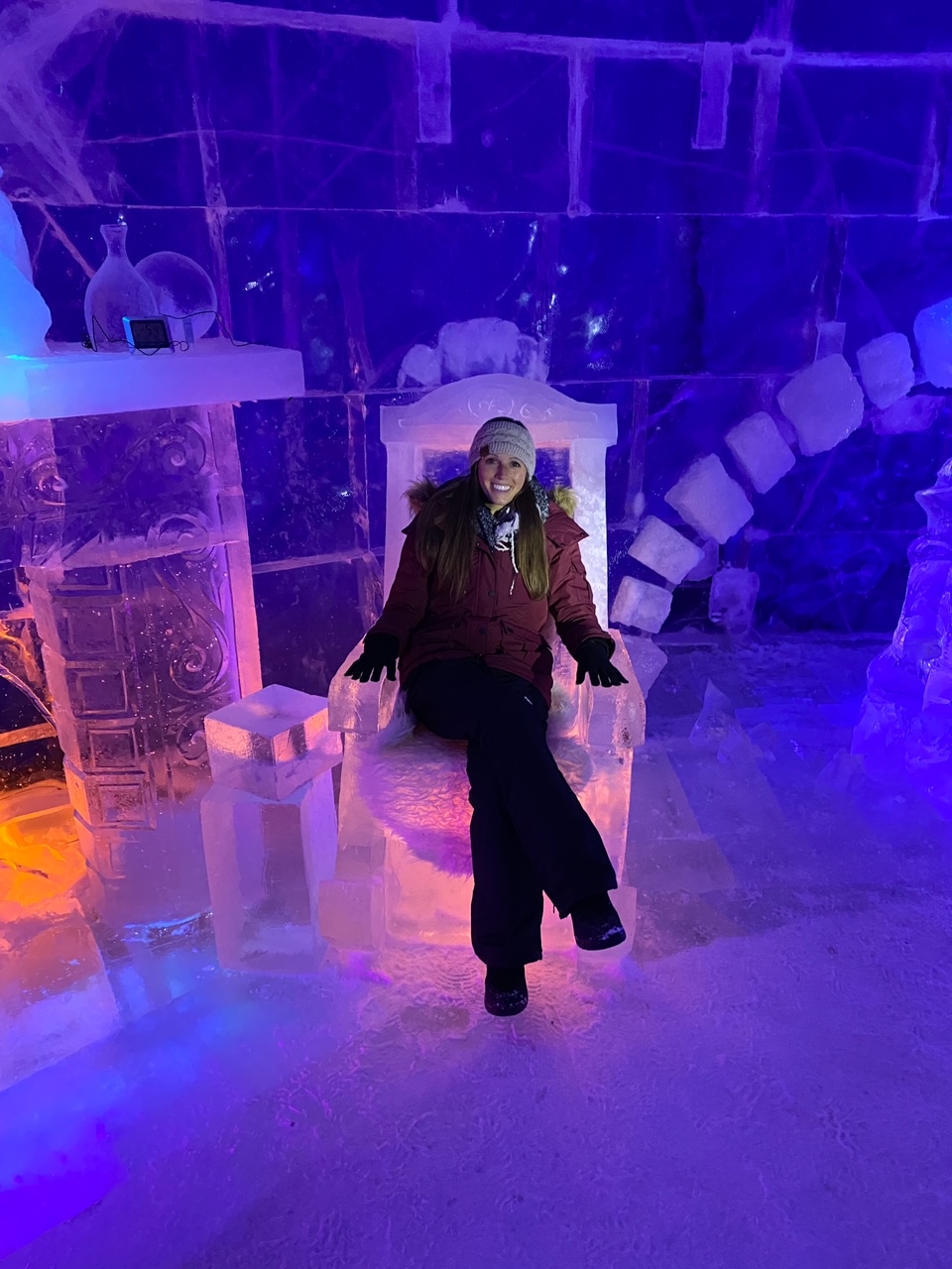 Sara hanging out on a chair made of ice at the Snowhotel Kirkenes