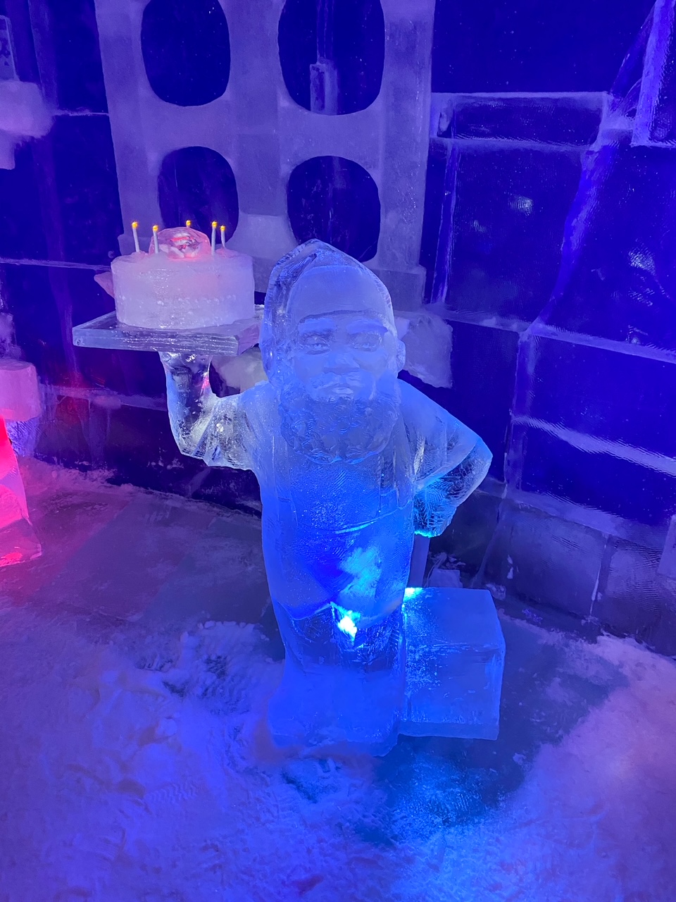 a cute elf ice sculpture at the Snowhotel Kirkenes