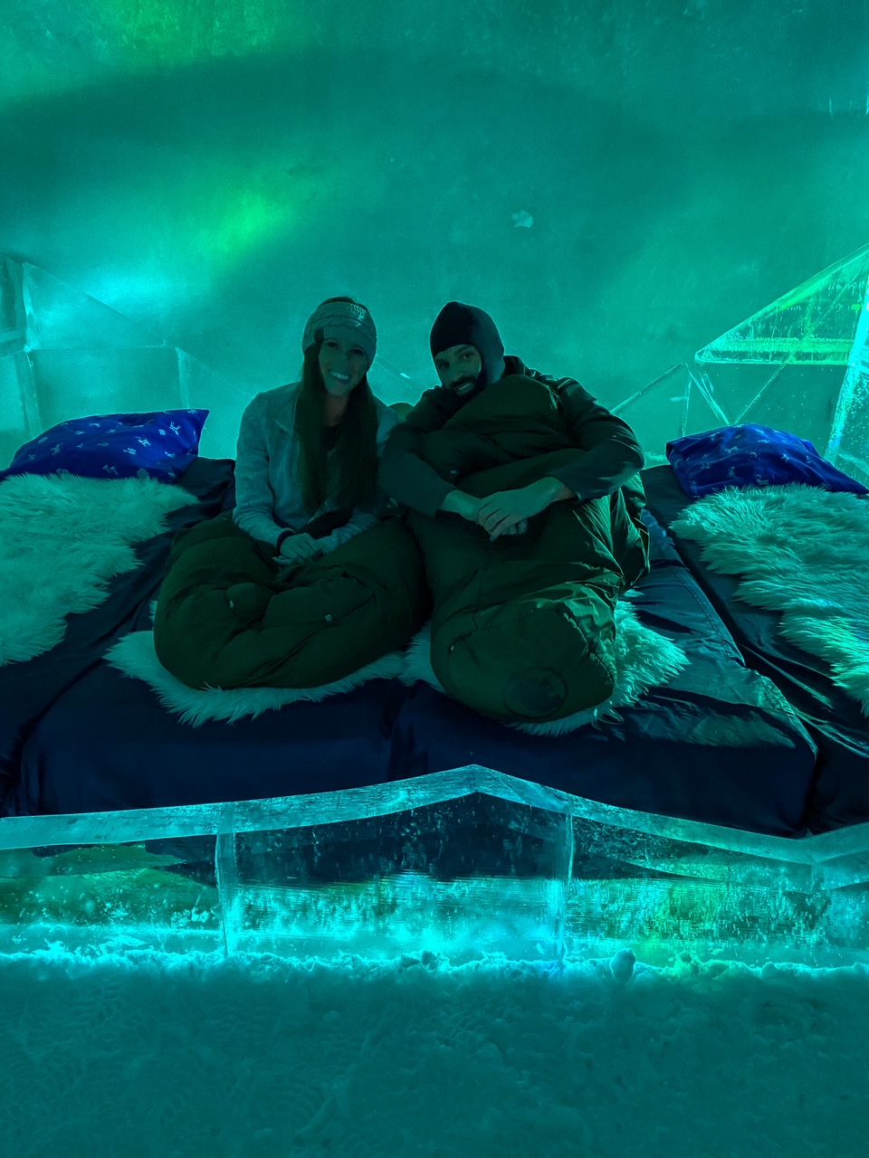 snuggled up in sleeping bags at the Snowhotel Kirkenes