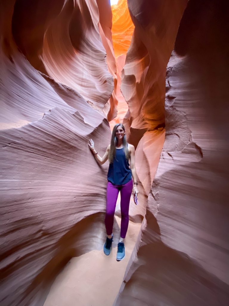 Sara posing inside Lower Antelope Canyon near Page, Arizona