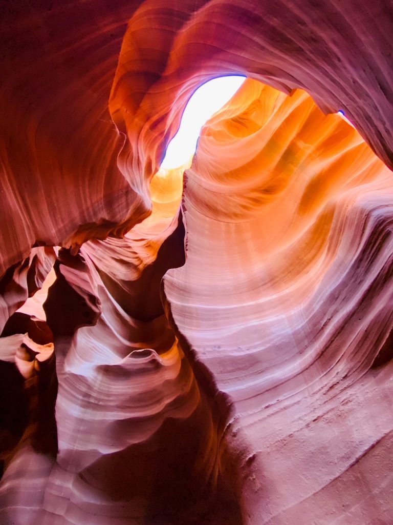 a golden orange view inside Lower Antelope Canyon in Page, AZ
