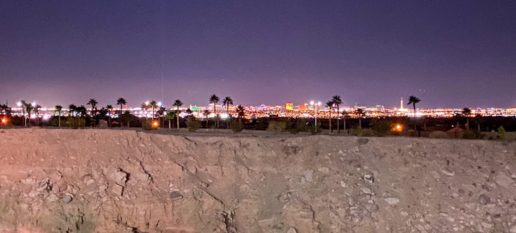 a view of Las Vegas all lit up from Lake Mead Boulevard