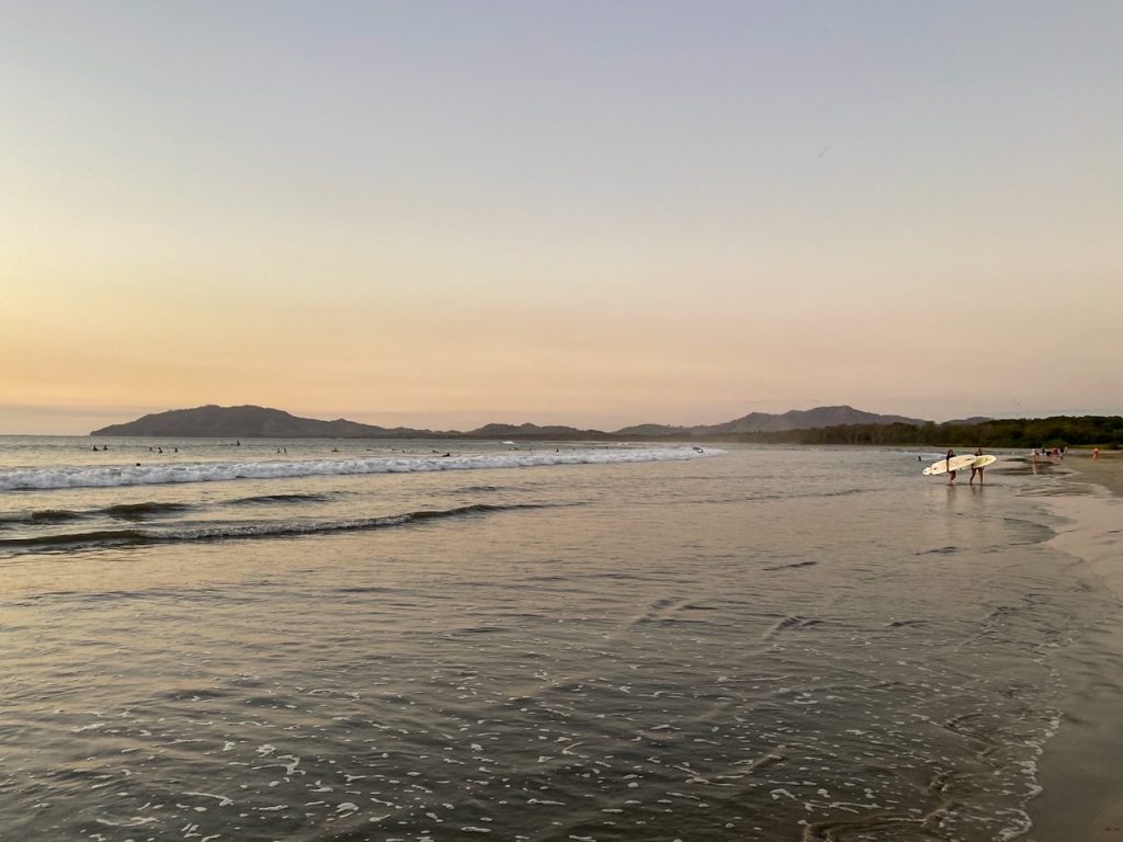 surfers on Tamarindo Beach