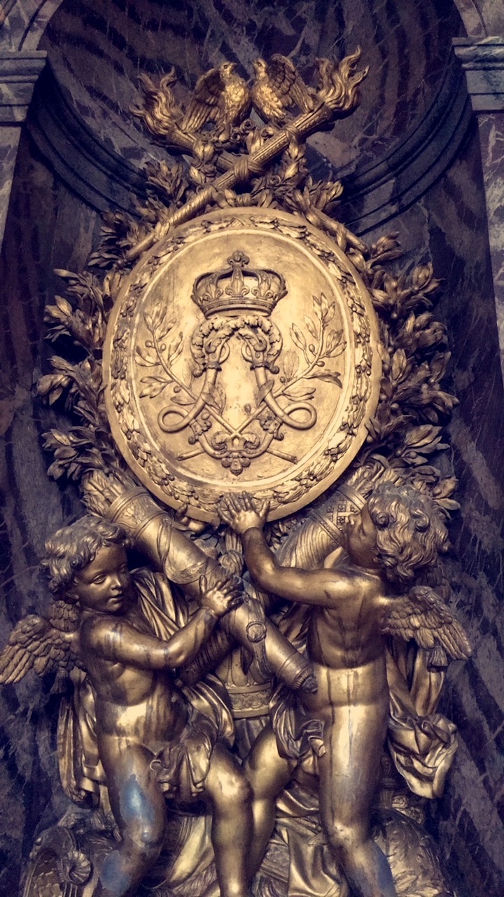 a statue inside the Palace of Versailles