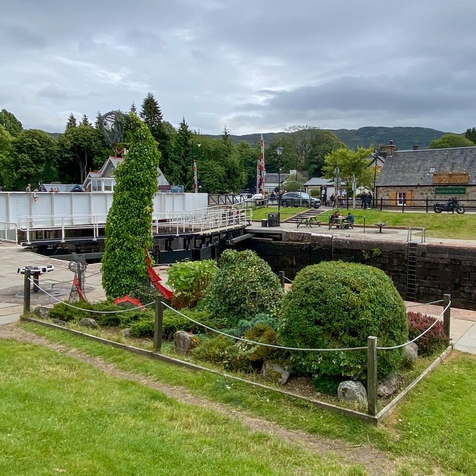 a shrub sculpture of Nessie, the Loch Ness Monster