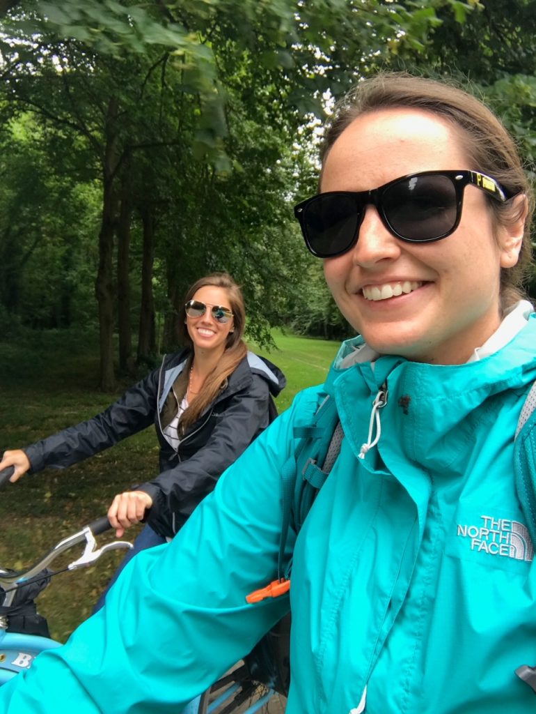 Sara and Katie biking around Versailles