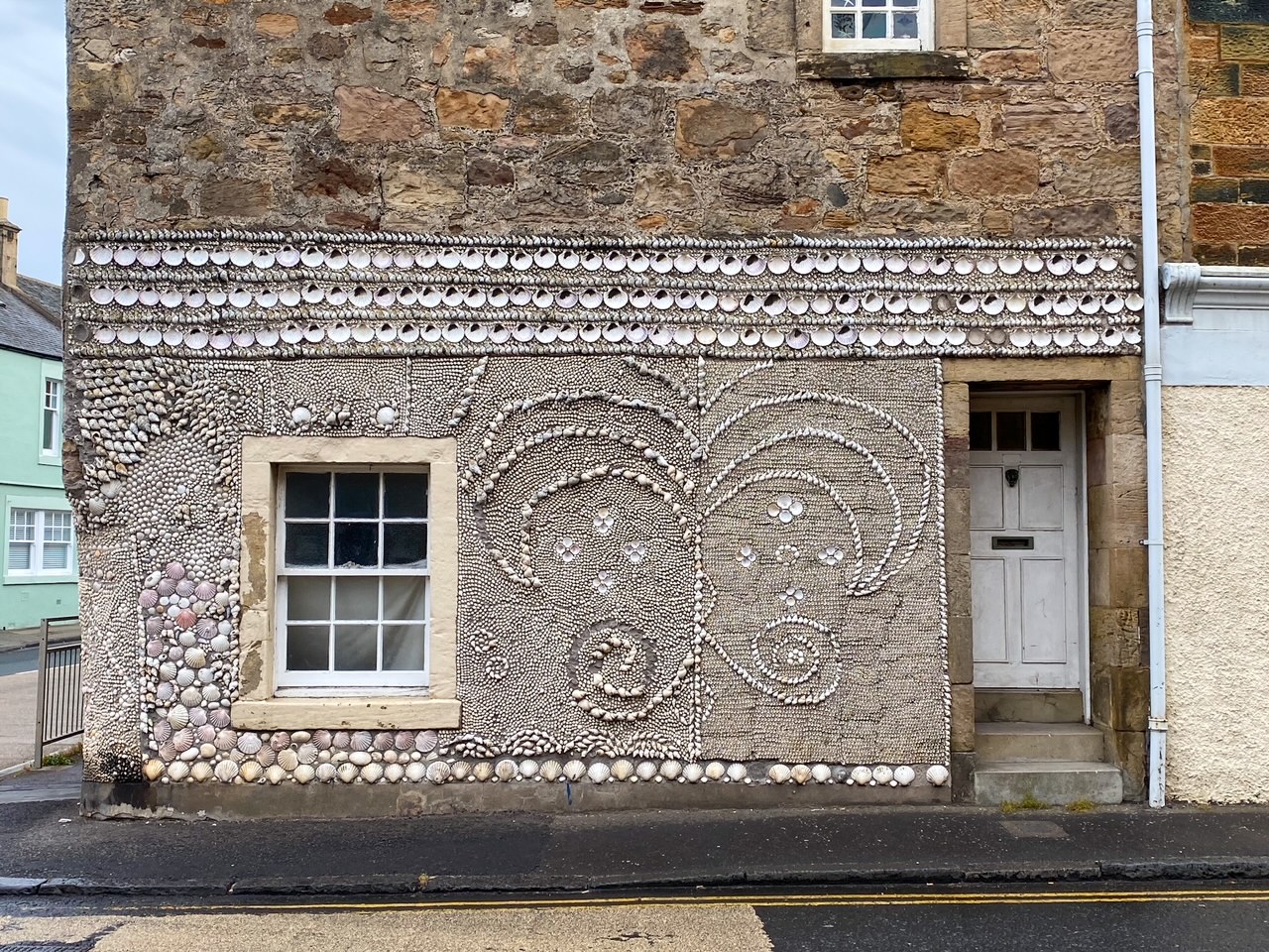 an intricately designed seashell house in Anstruther, Scotland