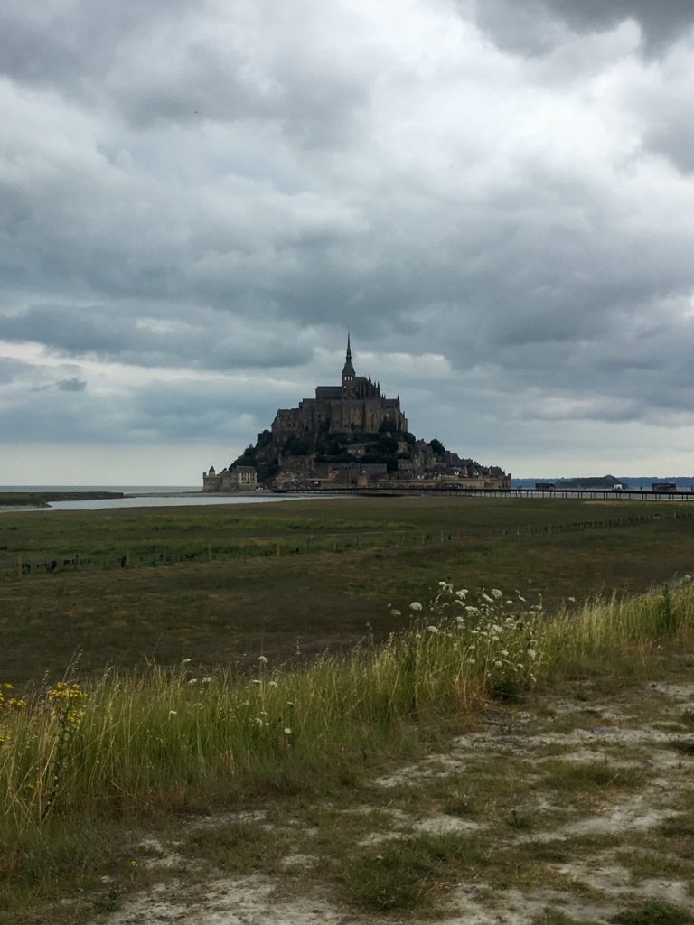 a view of Mont Saint-Michel in the distance