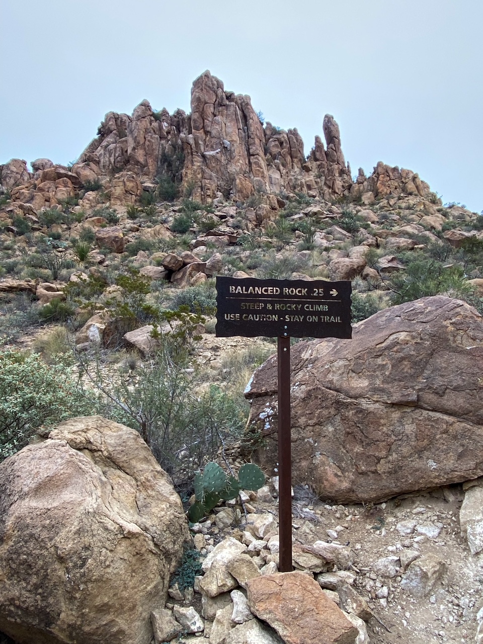 the rock scramble starts at this Balanced Rock sign