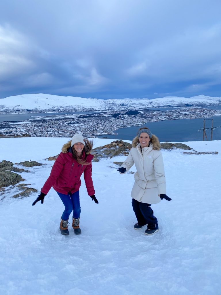 Sara & Allison jumping on Storsteinen mountain