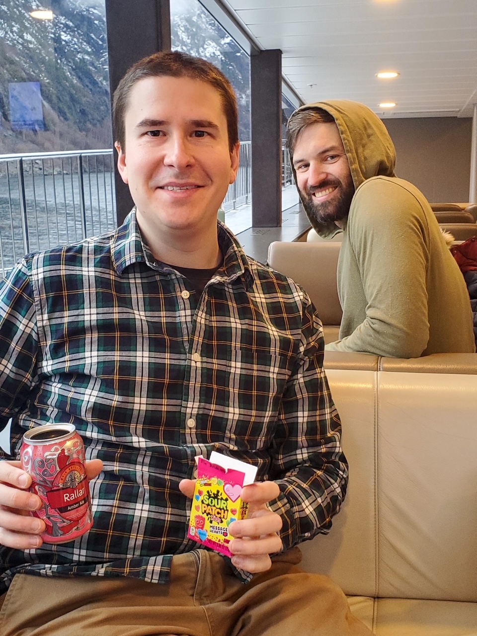 Ryan & Tim enjoying some beers and candy on the fjord cruise to Flam