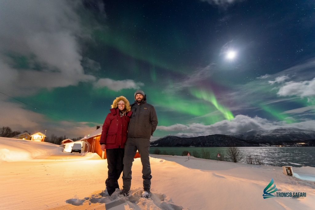 Sara & Tim with the Northern Lights in Tromso, Norway
