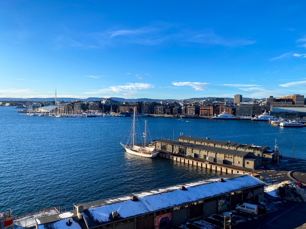 a view of Oslo harbor and fjord from the Aker Brygge neighborhood