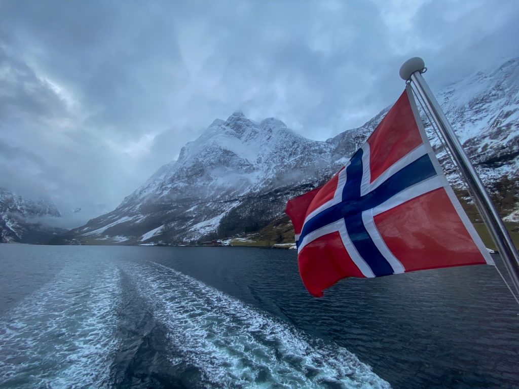 Norwegian flag on the fjord cruise