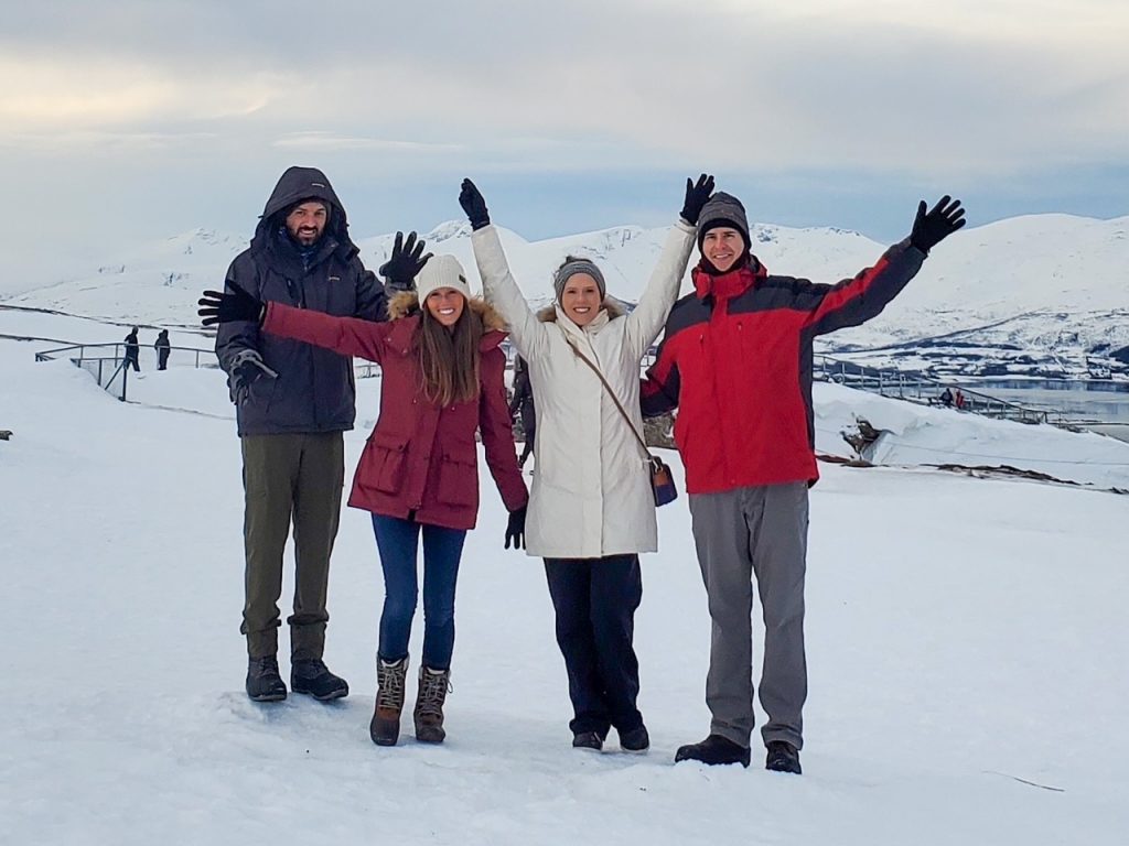 group shot at the top of Storsteinen Mountain