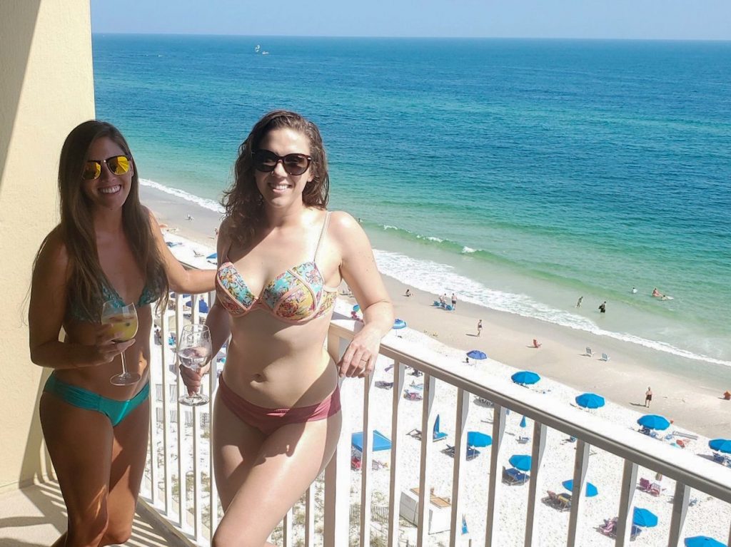 Sara & Allison on the balcony at our Gulf Shores Airbnb