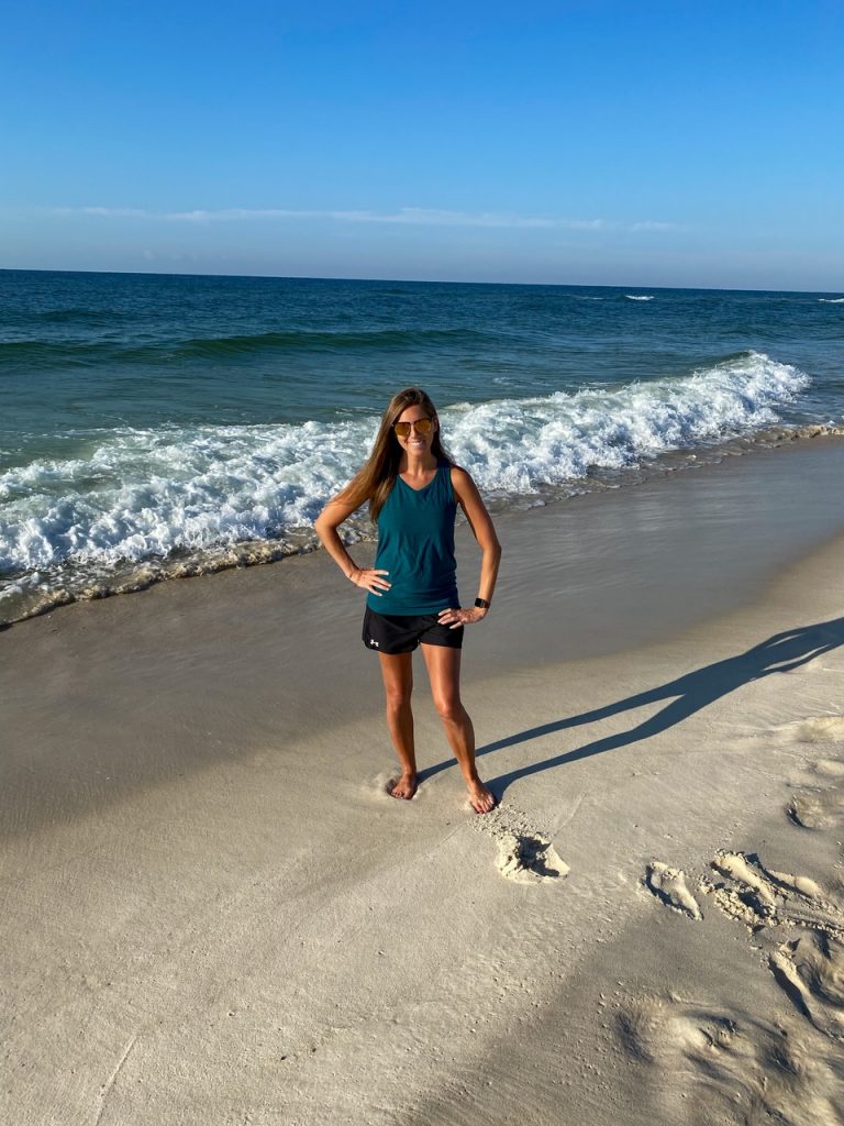 Sara walking along Gulf Shores Beach