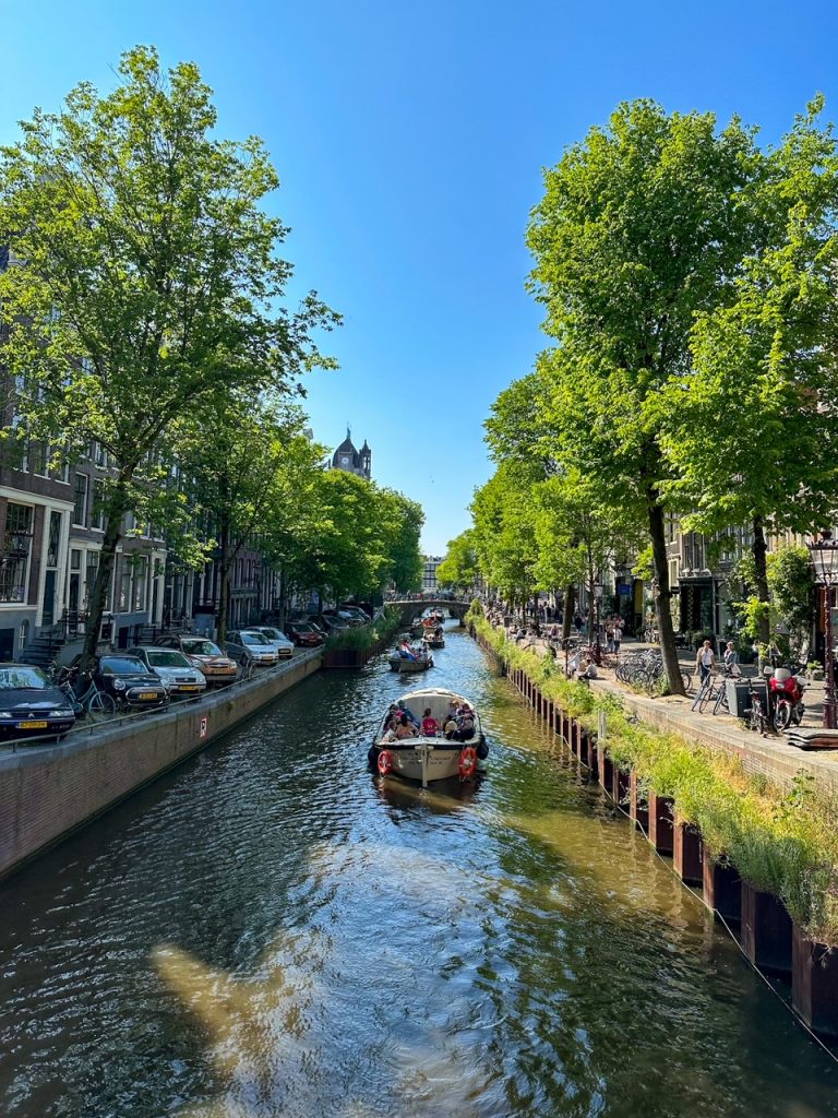 a boat on a canal in Amsterdam