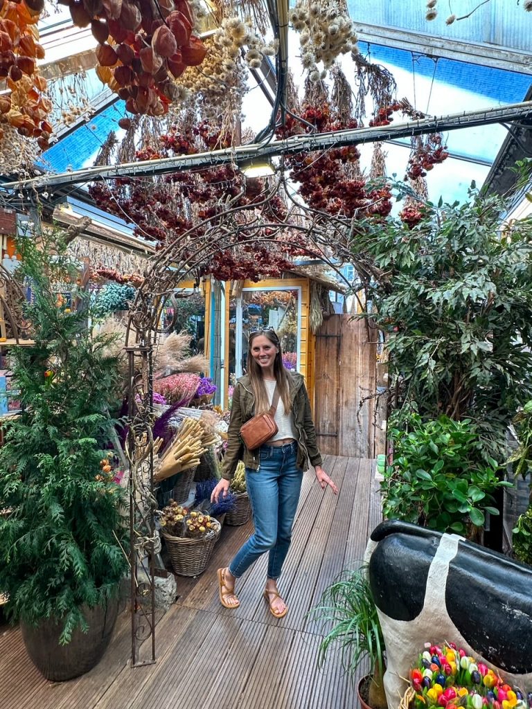 Sara exploring the Bloemenmarkt in Amsterdam in June