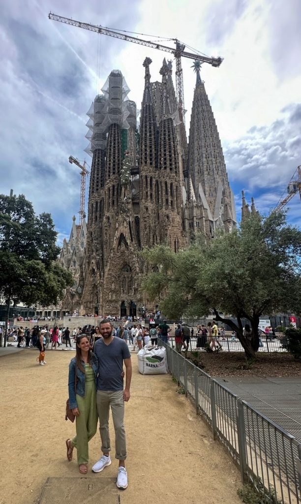 Sara & Tim standing in front of Sagrada Família