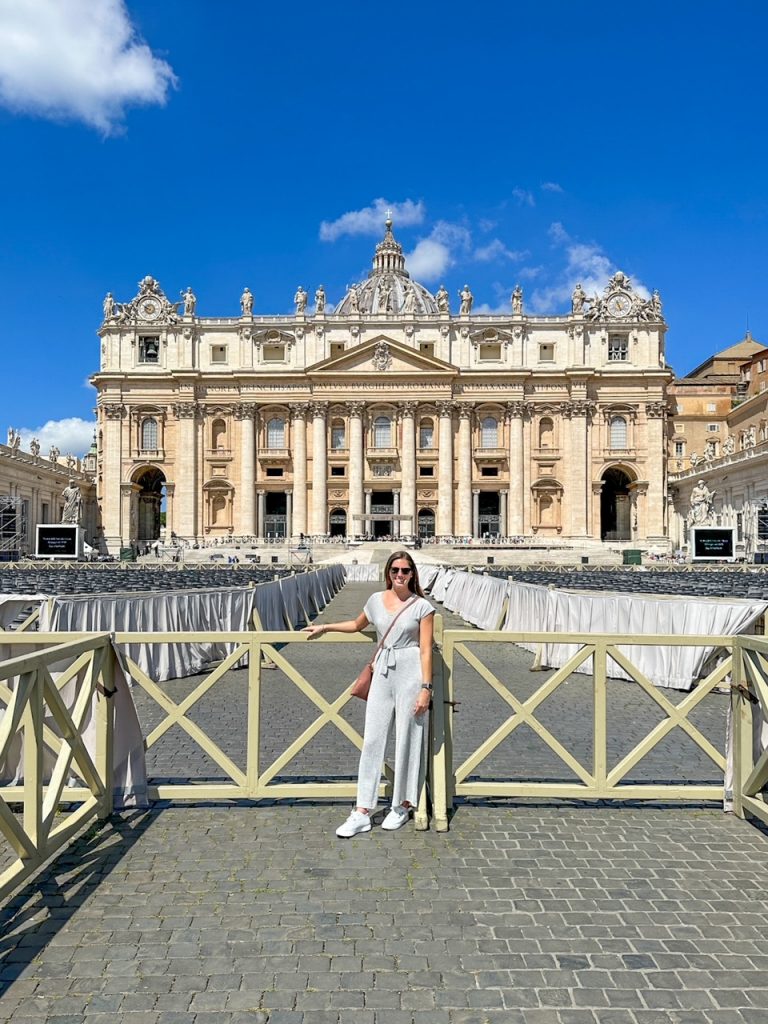 Sara in front of St. Peter's Basilica in Vatican City, a great addition to any Rome or summer Europe itinerary