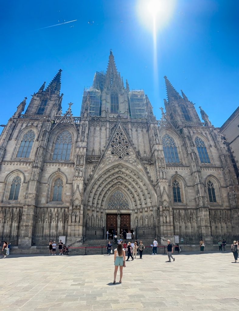 Sara outside The Cathedral of the Holy Cross and Saint Eulalia