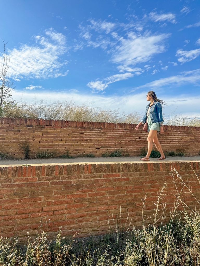Sara walking the walls of Montjuïc Castle in Barcelona