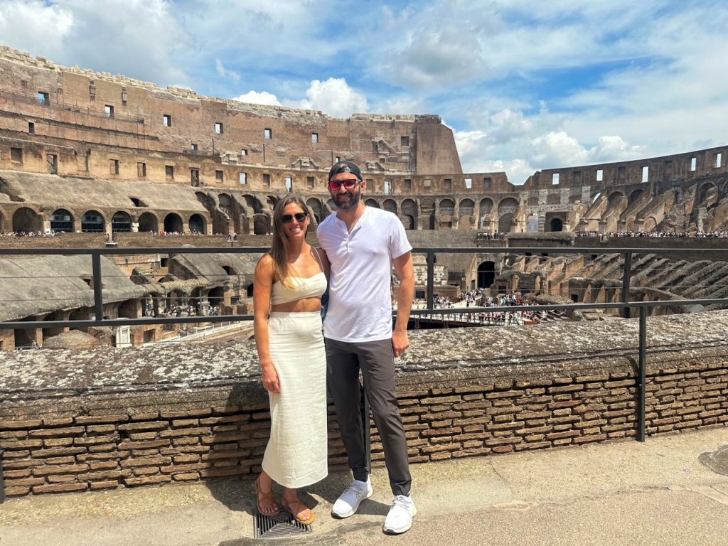 Sara & Tim in front of the Colosseum in Rome