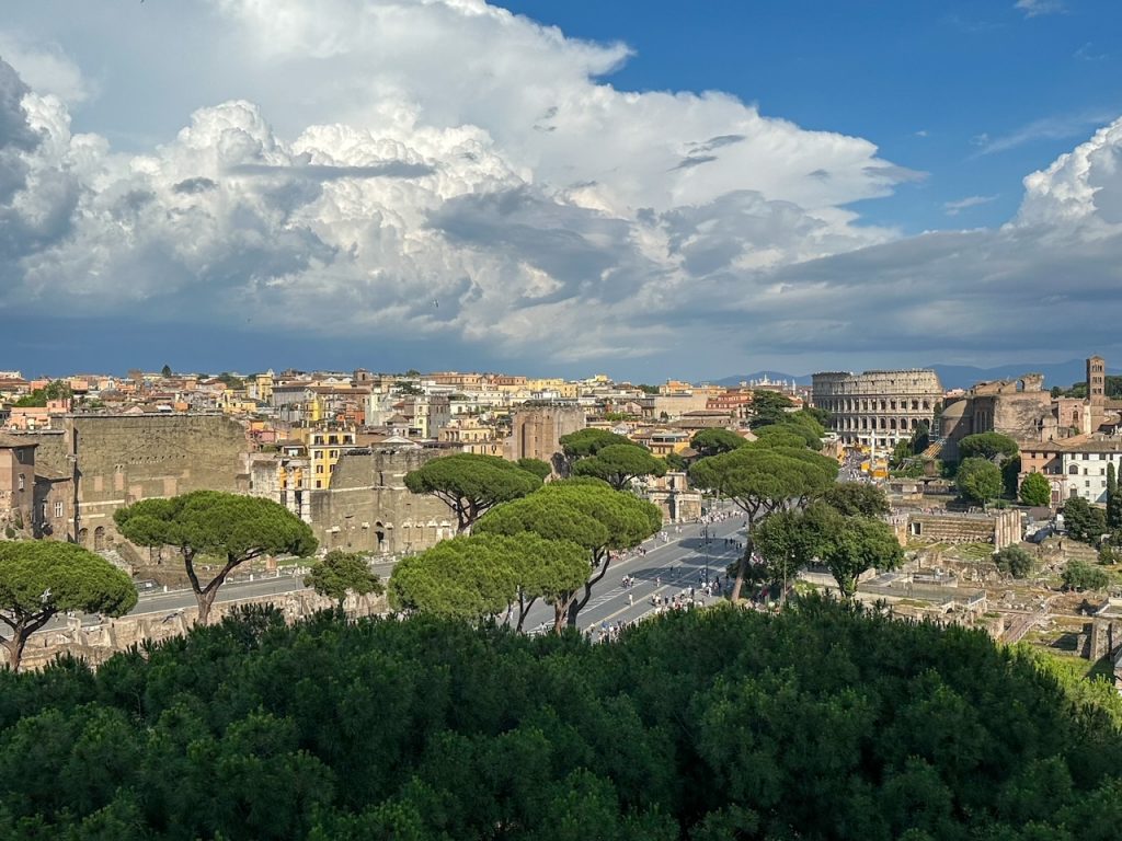 a view of the Colosseum and other famous Rome landmarks from the upper terrace of the Complesso Vittoriano
