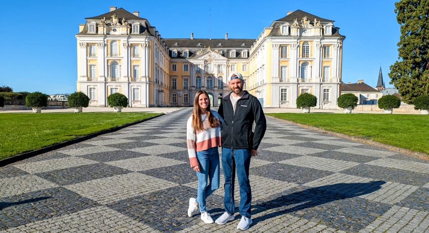 Tourists in front of Augustusburg Palace during their 7 days in Germany