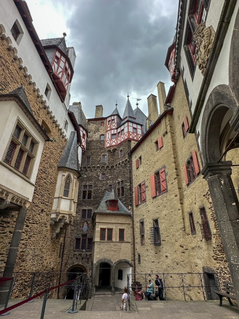 Exploring the Eltz Castle grounds on a guided tour