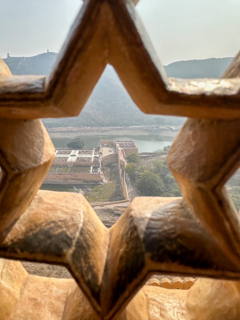 a cool view from a latticed window at Amer Fort