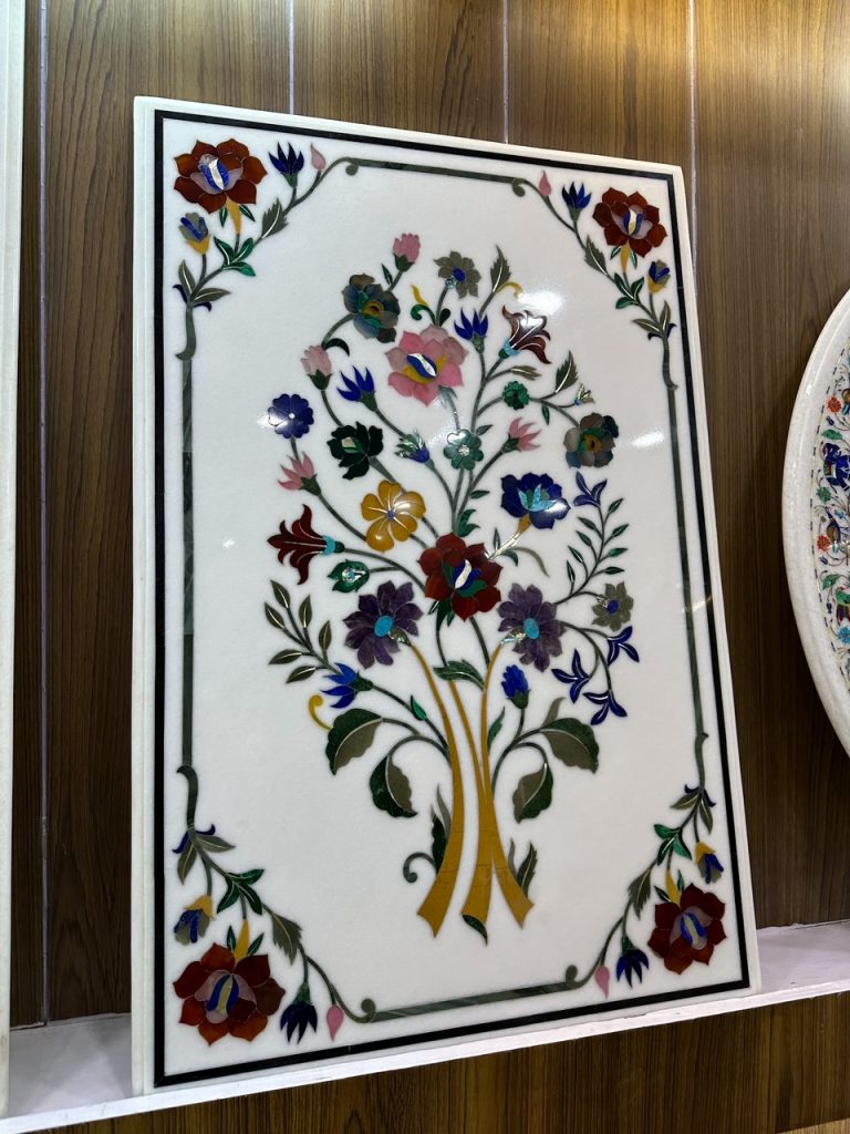 gorgeous marble inlay work by the ancestors of the family who built the Taj Mahal