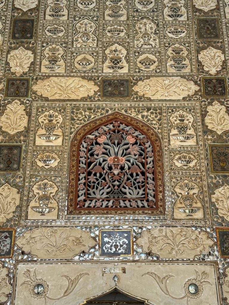 stunning designs at the Sheesh Mahal at Amer Fort